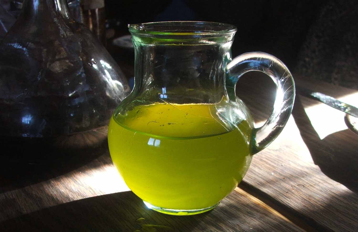 Plantain juice in a glass jug